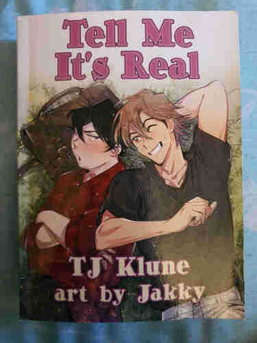 Photo of the cover of Tell Me Its Real by TJ Klune.