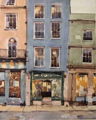 Watercolor painting of ground floor storefronts and above apartments along High Street in Oxford, England. Three slender buildings with storefronts on their ground floors and apartments above floors are huddled together in the late afternoon of a cloudy day, revealing lights from inside. The building on the left is painted in a light pink, with windows and doors on several stories - the second of which has a door capped with a half moon window and a wrought iron terrace residing above spotlight illuminated signage for a storefront display trimmed in baby blue. The middle building is slender, powder blue with a pair of windows on each floor above a storefront trimmed in dark green, displaying a very well lit interior in various yellows, oranges and blues. The building on the right is more squat than the others below an overcast band of sky; and painted in a muted green. Its ground floor storefront is trimmed in a pastel pink and lit brightly inside with blocks of yellow and orange.