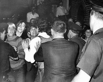 The only known photograph taken during the first night of the riots, by freelance photographer Joseph Ambrosini, shows gay youth scuffling with police. By Stage and Cinema -DVD Review: STONEWALL UPRISING (PBS) Photographer: Joseph Ambrosini of the New York Daily News, Fair use, https://en.wikipedia.org/w/index.php?curid=18998998