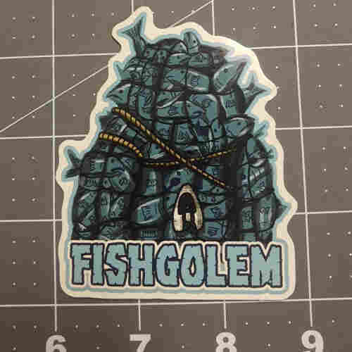 Sticker of a golem, made out of fish, held together with a fishing net and rope. Craggy text below it reads "FISHGOLEM"