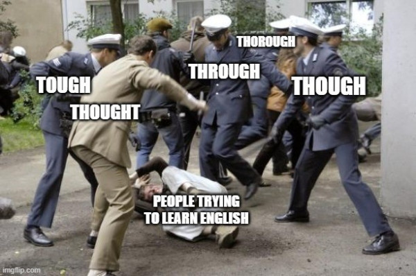 a person lying on the ground getting kicked at by a group of people, all but one of them in uniform. the person on the ground is labelled 'people trying to learn english' and the people lamming them 'tough', 'thought', 'though', 'through', and 'thorough'