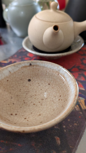 Green tea in a crackleware bowl.