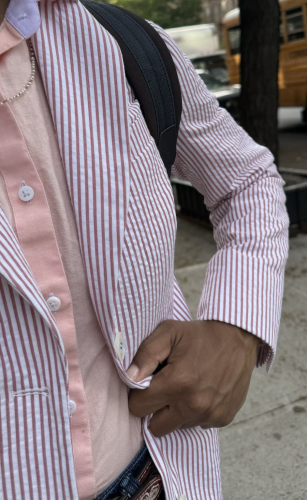 Red and white seersucker jacket with salmon pink linen shirt. 