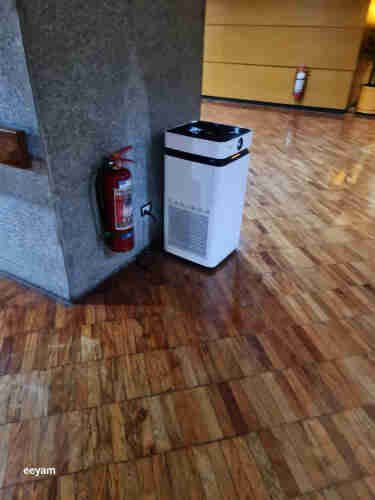 Hepa filter in a hallway inside the PICC beside a fire extinguisher