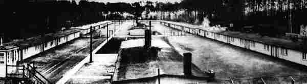 An overview of the Stutthof concentration camp. Three lines of barracks surrounded by threes.