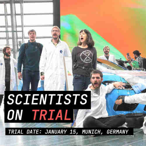 Several scientists in white lab coats, along with other activists, are glued to a luxury car in a showroom in Germany, to call out the greenwashing and high resource consumption of the motor industry. They are on trial on Monday 15th January in Munich, Germany
