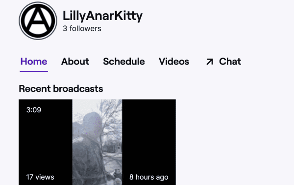 A screenshot of the Twitch account of Aaron Bushnell. The username is "LillyAnarKitty," with a circle A for an icon. There is a still of the beginning of the video, showing Aaron walking through Washington, DC in his military uniform.
