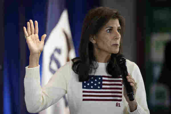 Republican presidential candidate Nikki Haley declined to say slavery was a cause of the Civil War, instead blaming the role of government — comments she qualified the following day. | Charlie Neibergall/AP