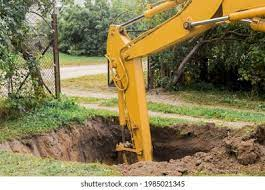 backhoe digging a hole