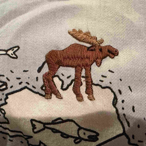 A small embroidered moose. 