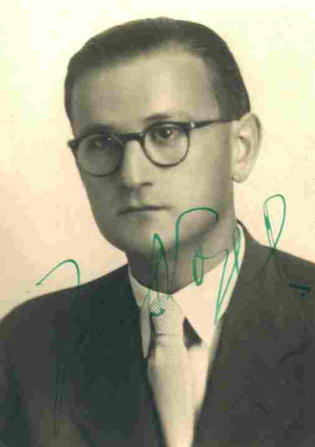 A portrait ID photographed of a men in glasses, a jackets, shirt and tie. 