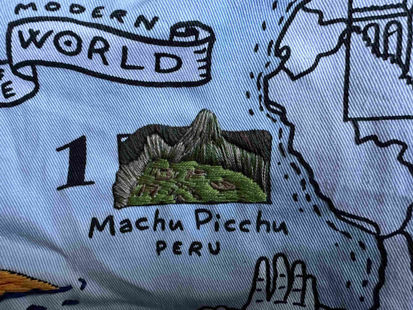 An embroidered representation of Machu Picchu 