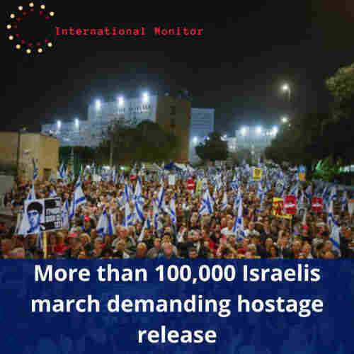 Israelis marching to demand hostages release. Caption: More than 100,000 Israelis march demanding hostage release.