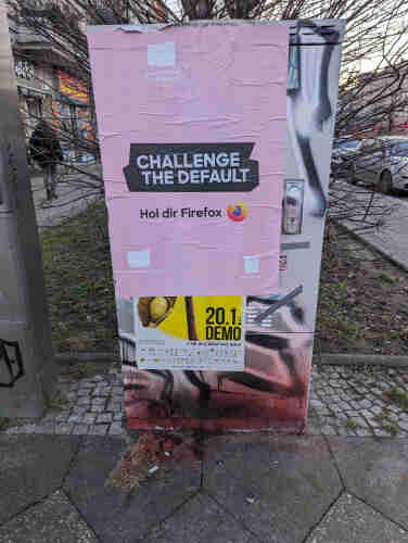 A pasteup poster in Kreuzberg, Berlin reading

CHALLENGE THE DEFAULT
Hol dir Firefox [Firefox logo]