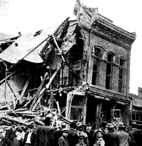 Union hall of the Western Federation of Miners local at Butte, Montana, after its destruction by dissident miners on 23 June 1914. By Unknown photographer - International Socialist Review, Aug 1914 v15 n2 p.89., Public Domain, https://commons.wikimedia.org/w/index.php?curid=49389977