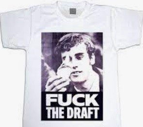 T shirt with image of a young man burning a draft card. Reads: Fuck the Draft. 