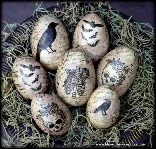 Eggs treated with an antiquing background with images painted on top of ravens, bats, skulls and a rib cage. Ooh! Spooky! *waggles fingers spookily 