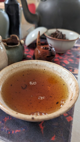 Black tea in a crackled bowl.