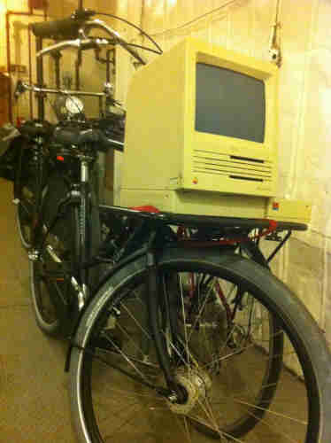 classic Mac on a bike's front rack