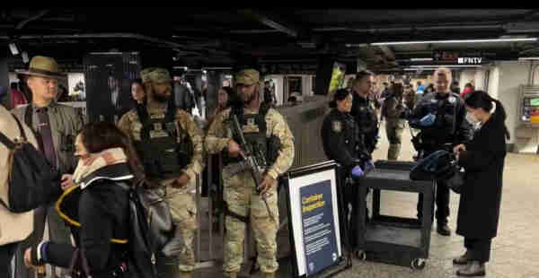 new york city subway full of cops and armed national guard soldiers doing bad checks