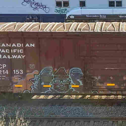 Train car with graffiti rolling through Kamloops BC Canada