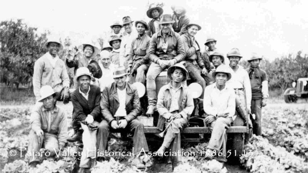 Filipino farm workers in Pajaro Valley, near Watsonville, California, September 1939. Photo © Mary Oliver/Pajaro Valley Historical Association.