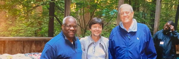 Photo of Clarence Thomas, David Koch, and Ken Burns at Bohemian Grove, a men only 2,700-acre campground owned by San Francisco’s secretive Bohemian Club