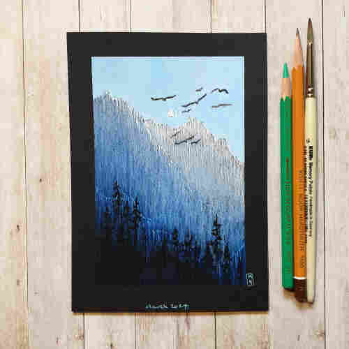 Original drawing - Mountain Flight
A landscape drawing of a mountainous area in a palette of blues. There are trees in deep shadow and birds flying in the sky. The drawing is in an illustrative style.
Materials: colour pencil, mixed media, acid free black artist paper
Width: 5 inches
Height: 7 inches