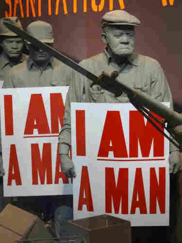 I Am a Man - Diorama of Memphis Sanitation Workers Strike, showing men carrying placards that say, “I am a Man.” - National Civil Rights Museum - Downtown Memphis - Tennessee – USA. By Adam Jones, Ph.D. - Own work, CC BY-SA 3.0, https://commons.wikimedia.org/w/index.php?curid=22197466