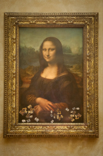 Mona Lisa, modified to have aged, dried knucklebones scattered along the lower edge of the painting.