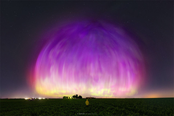  The aurora's energetic particles originated from CMEs ejected from our Sun over sunspot AR 6443 a few days before. This large active region rotated to the far side of the Sun last week, but may well survive to rotate back toward the Earth next week. 

Image Credit & Copyright: Xuecheng Liu & Yuxuan Liu