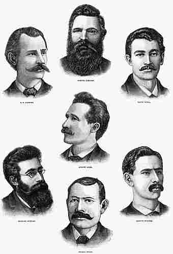Engraving of the seven anarchists sentenced to die for Degan's murder. An eighth defendant, Oscar Neebe, not shown here, was sentenced to 15 years in prison. By Frank Leslie&#039;s Illustrated Newspaper - http://www.lucyparsonsproject.org/images/images_haymarket8_large.jpg, Public Domain, https://commons.wikimedia.org/w/index.php?curid=3416901