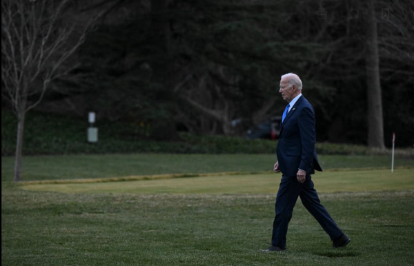 President Biden walks to Marine One on the South Lawn of the White House on Feb. 9. (Ricky Carioti/The Washington Post)