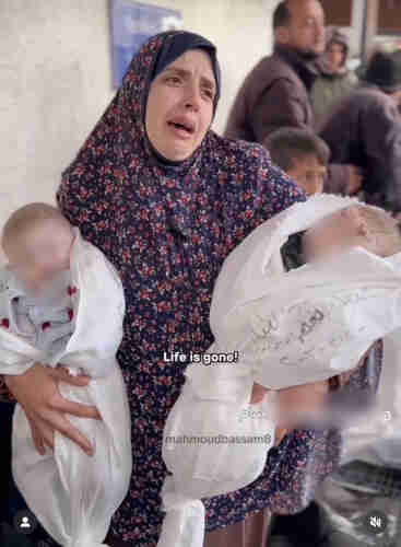 palestinian mother carrying her 2 dead children murdered by IDF.