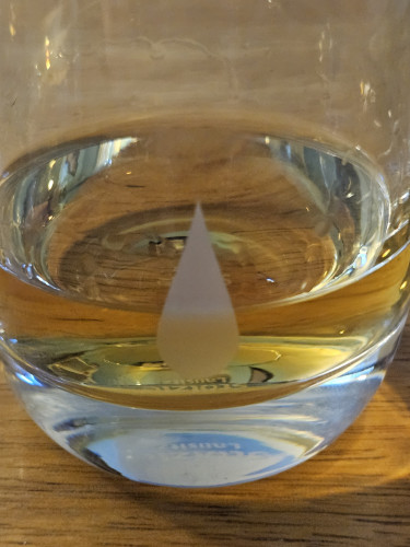 A small glass of Writers' Tears whiskey