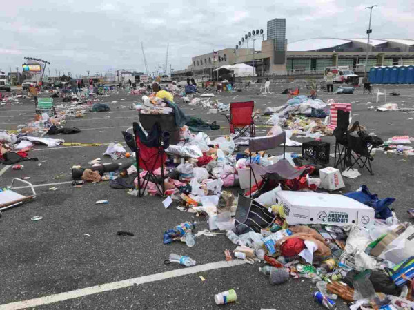 loads of trash, abandoned camping chairs, and food thrown on the ground by MAGAts in the parking lot.