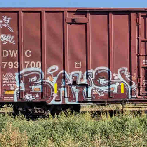 Train car with graffiti rolling through Kamloops BC Canada