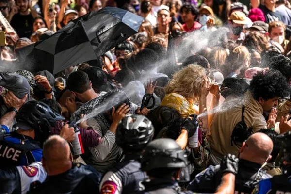 A state trooper pepper sprays pro-Palestinian protesters at the University of Texas in Austin, Texas, on April 29, 2024 [Aaron E. Martinez/American-Statesman/USA Today Network via Reuters]