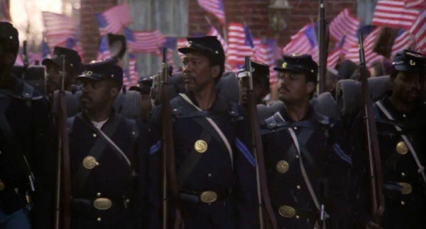 Black soldiers march in formation with each other
