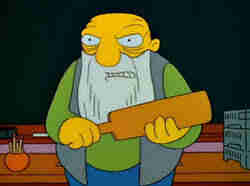 Jasper from The Simpsons, an old bald man with a long gray beard. Holding his paddle, ready to point out the many things that will resort in a paddlin'.