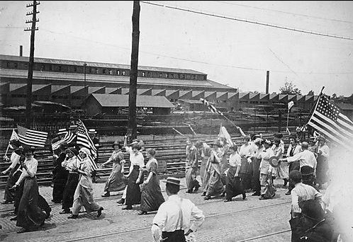 Women marching on Edgewood Avenue, Swissvale, PA, during the 1914 Westinghouse strike. The Westinghouse Union Switch and Signal shop is visible in the background. https://secretpittsburgh.pitt.edu/sp/node/555#