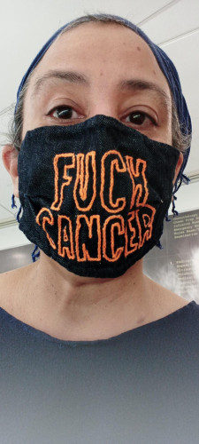 me, wearing my hand-embroidered FUCK CANCER mask