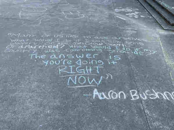Words from Aaron Bushnell in chalk outside of occupation in Arcata, CA. 

"Many of us like to ask ourselves, 'What would I do if I was alive during slavery? Or the Jim Crow South? Or apartheid? What would I do if my country was committing genocide?

The answer is, you're doing it. Right now."