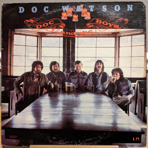 front album cover with Doc and the boys sitting at a large table with a pitcher of beer