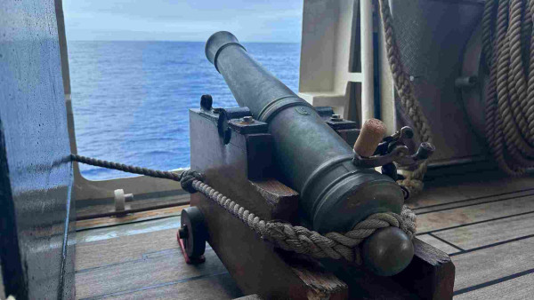 Tiny canon aimed out to sea. 