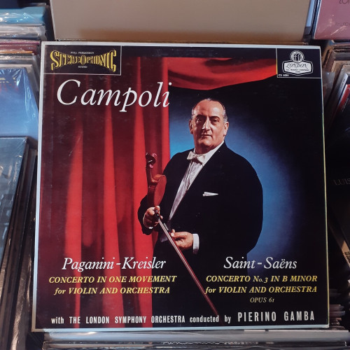 Album cover features a color photograph of the Italian born British violinist Alfredo Campoli, holding a violin and bow. Behind him is a bright red curtain and a blue background.