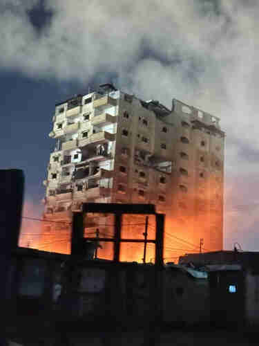 a civilian building was full of displaced Palestinians was bombed in Rafah tonight
