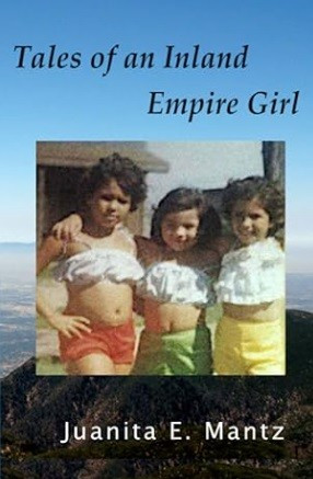 Bookcover of "Tales of an Inland Empire Girl," by Jaunita E. Mantz, with portrait of three little girls with their arms around each other. In the background a view of the valley and blue sky.