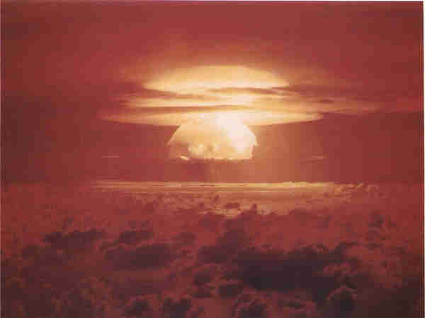 Nuclear weapon test Bravo (yield 15 Mt) on Bikini Atoll. The test was part of the Operation Castle. The Bravo event was an experimental thermonuclear device surface event. By United States Department of Energy - US gov, Public Domain, https://commons.wikimedia.org/w/index.php?curid=446935
