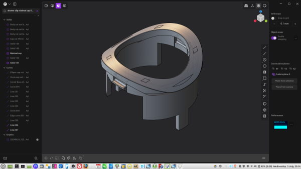 A screenshot of a 3D-printed component, designed and rendered in the Plasticity 3D software package. It's got multiple curves, holes, lugs and fiddly bits. 